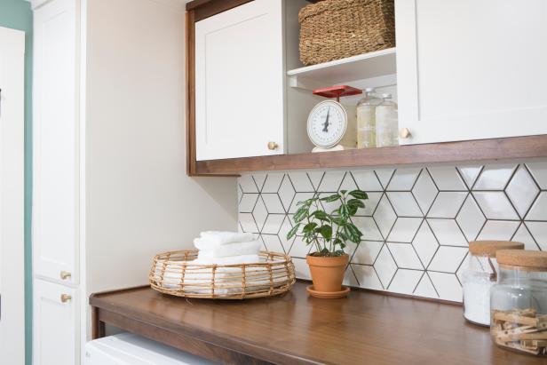 Contemporary Neutral Laundry Room with White Backsplash | HGTV