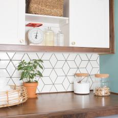 Contemporary Neutral Laundry Room with White Tile Backsplash