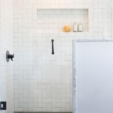 Modern Black and White Master Bathroom with a Shower and White Tile Surround  