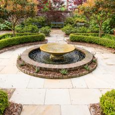 Formal Garden With Fountain and Benches