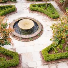 Formal Garden With Round Fountain