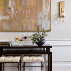 Black Console Table and Gold Art