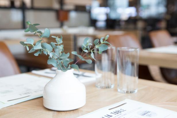 White Vase on Wooden Neutral Dining Table 