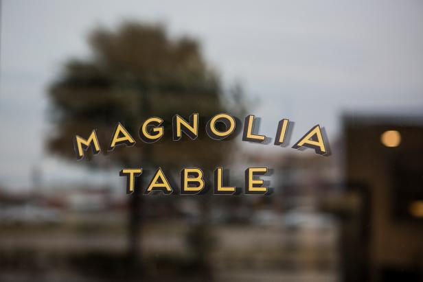 Golden "Magnolia Table" Window Logo