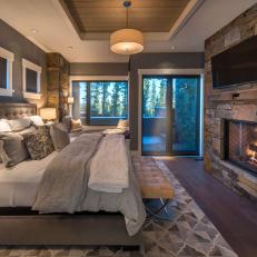 Rustic Transitional Bedroom With Fireplace