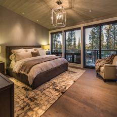 Neutral Transitional Bedroom With Forest View
