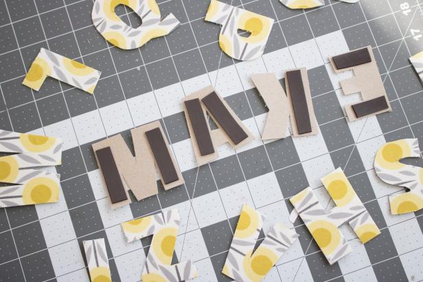 Use cardboard and fabric to make pretty ABC magnet letters.