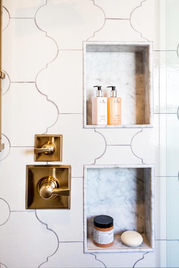 Stylish white tiles and niche create interest in this modern shower.
