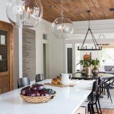 Rustic Black and White Kitchen with Glass Globe Light Fixture 