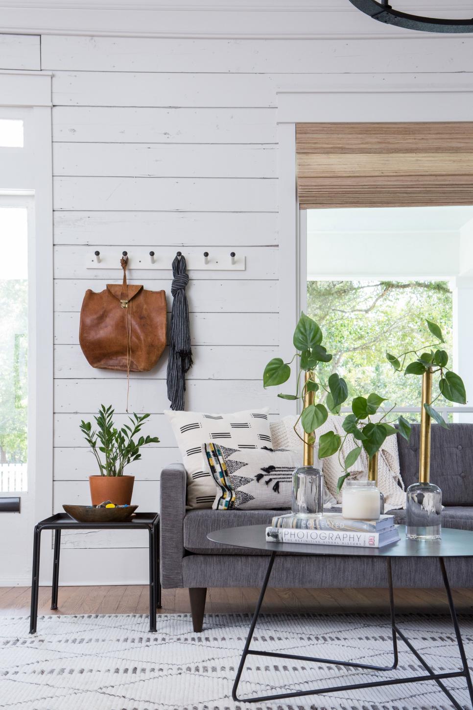 Rustic Black And White Living Room With Gray Sofa Hgtv Step inside an austin home that pairs cozy neutrals with loads of art. white living room with gray sofa hgtv