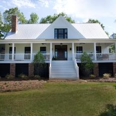 White Farmhouse Exterior With Porch