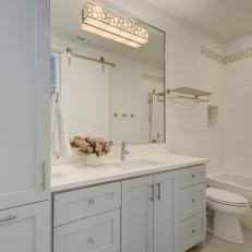 White Bathroom With Mosaic Tile Stripe