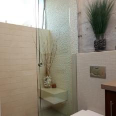Various Textures Create Interest in Small, Modern Guest Bathroom