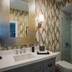Metallic Bathroom With Diamond-Patterned Wallpaper