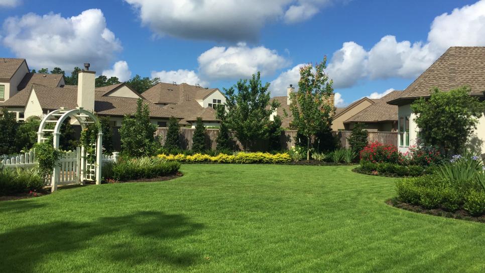 Backyard Lawn and Arbor | HGTV