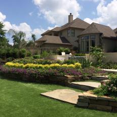 Backyard With Lawn and Stone Walkway