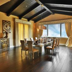 Gold Mediterranean Dining Room With Wood Ceiling
