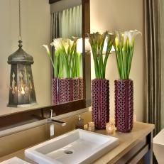 Single Vanity Bathroom With Purple Vase