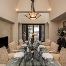 Southwestern Dining Room With Glass Table