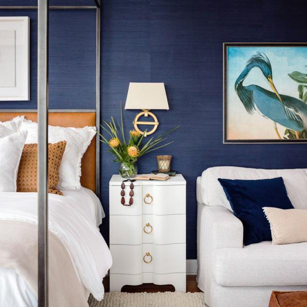 Create a elegant master bedroom with a navy and white colour combo. 