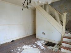 The original dinning room and staircase in the townhome that Mina and Karen are renovating as seen on Good Bones 
