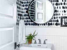 powder room with graphic wallpaper