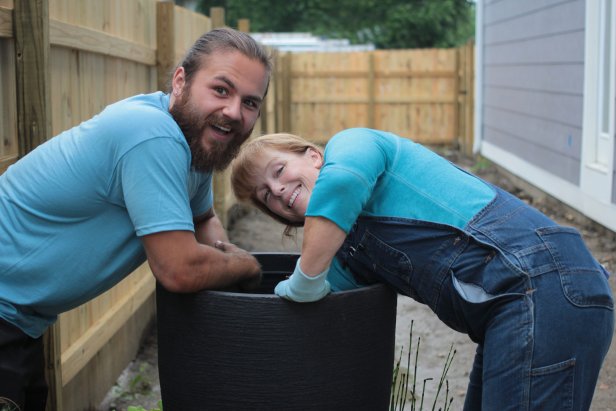 Tad and Karen pause for a moment while working on the exterior of the Woodlawn House, as seen on Good Bones.