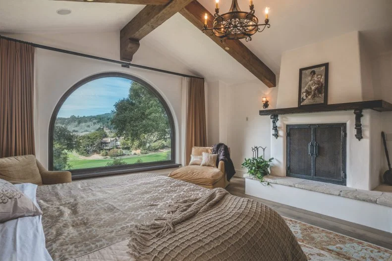 Bedroom With Arched Window