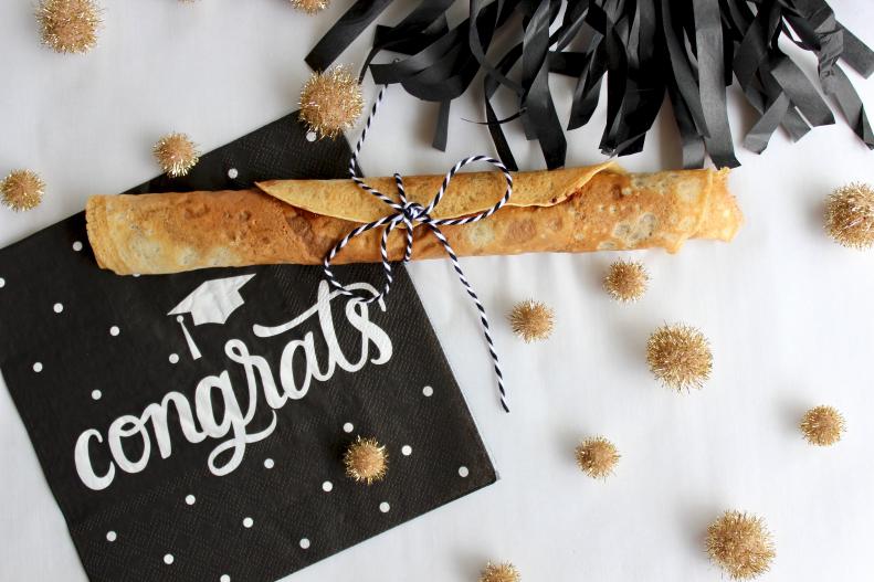Diploma-Shaped Crepe on Graduation-Themed Napkin