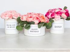 Surprise a loved one with a hatbox full of their favorite blooms.