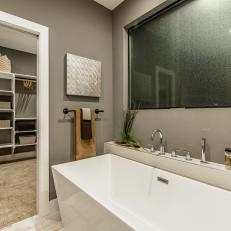 Industrial Master Bathroom with Freestanding Bathtub