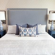 Gray and Blue Bedroom with Textured Wallpaper, Upholstered Headboard
