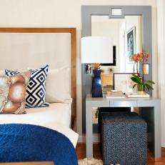 Neutral Bedroom with Hardwood Floors, Wood and Upholstered Headboard