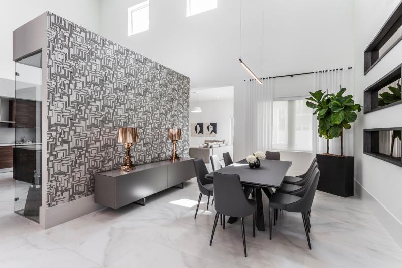 Modern Dining Room with Geometric Wallpaper Accent Wall 