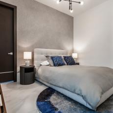 Oversized Doors Add Contrast and Grandeur to Neutral Master Bedroom 
