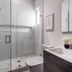Simple, Elegant Guest Bathroom with Sleek, Clean Features