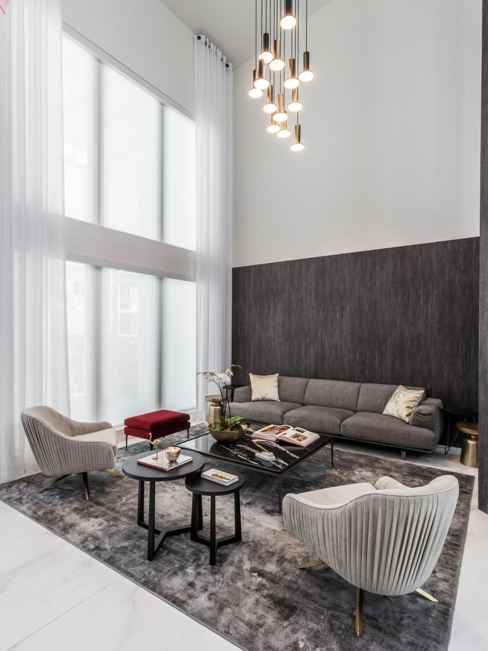 Modern Light Fixture Creates Connectedness in Formal Living Room | HGTV