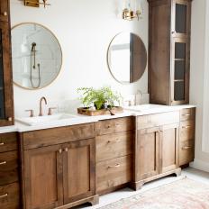 Storage Towers Add Warmth, Height and Dimension in Neutral Bathroom