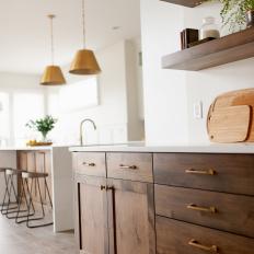 Wood Cabinets with Brass Details Add Affordable Glam to the Home