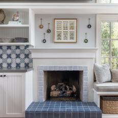 Country Kitchen With Blue-Trimmed Fireplace