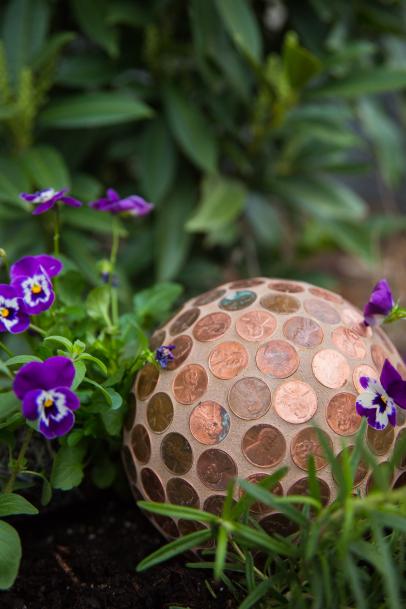 I keep finding these foil balls in my garden, what is the black residue  inside? Any ideas?!? : r/whatisthisthing