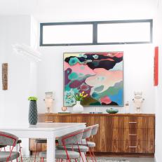 Dining Room With Modern Art And Midcentury Modern Furnishings