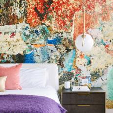 Modern Master Bedroom Detail With Multicolored Accent Wall And Side Table With Pendant