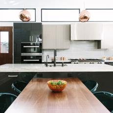 Modern Eat In Kitchen With Work Island With Built In Dining