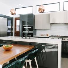 Modern Eat In Kitchen With Gray Cabinets And Stainless Steel Built In Appliances