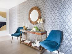 Blue Chairs on Either Side of Console Table