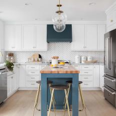 Blue-Gray Island Adds Dash of Color to White Transitional Kitchen