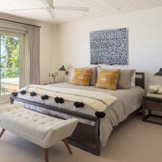 Neutral Master Bedroom With Yellow Pillows