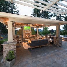 Contemporary Outdoor Living Room Gazebo With Stone And Wood Accents