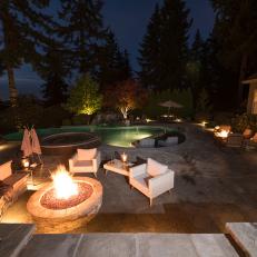 Contemporary Back Yard With Stone Fire Pit And Swimming Pool